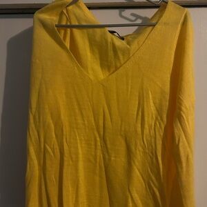 Women’s yellow sweater size large.